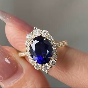 Ring. Elegant Gold and Blue Sapphire Ring